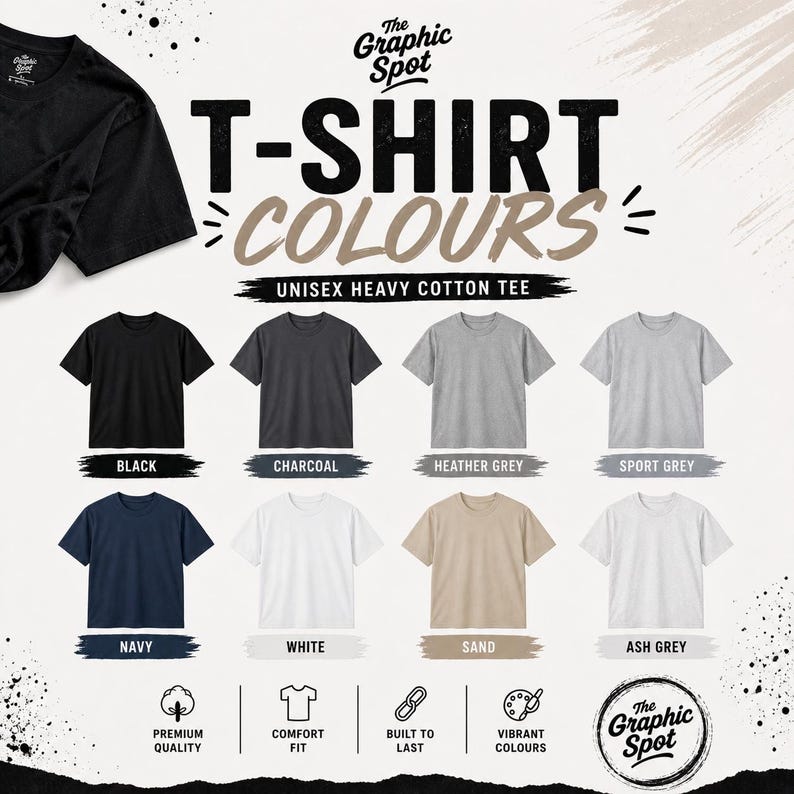 Color chart for The Graphic Spot unisex heavy cotton t-shirt showing 8 available colors: black, charcoal, heather grey, sport grey, navy, white, sand, and ash grey, with icons for premium quality, comfort fit, durability, and vibrant colors