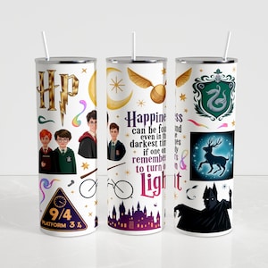 May include: Three white insulated tumblers with various Harry Potter-themed designs. One features the HP logo, characters, and Platform 9 3/4. Another has a golden snitch and the quote "Happiness can be found even in the darkest times." The third has a stag and a dark figure.