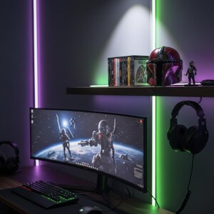 May include: A gaming setup featuring a curved monitor displaying a space battle scene. A keyboard, mouse, and headset are on the desk. A shelf above holds a Mandalorian helmet, action figure, and game discs. The wall has purple and green LED lights.