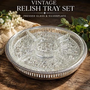 May include: A vintage relish tray set with pressed glass and silverplate. The clear glass tray features a starburst design and is sectioned. The silverplate rim has a decorative edge. The text "VINTAGE RELISH TRAY SET" is at the top.