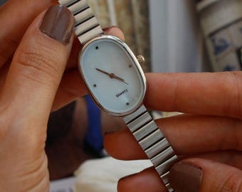 Silver-Tone Oval Watch, Blue Dial, Elegant Vintage Metal Band