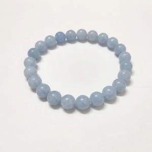 Aquamarine gemstone bracelet for calming energy and throat chakra.