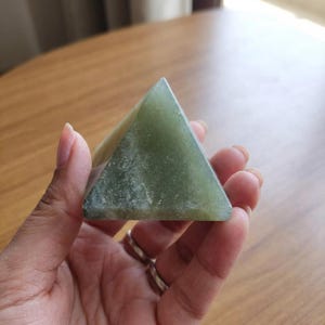 Heart chakra healing pyramid crafted from green aventurine