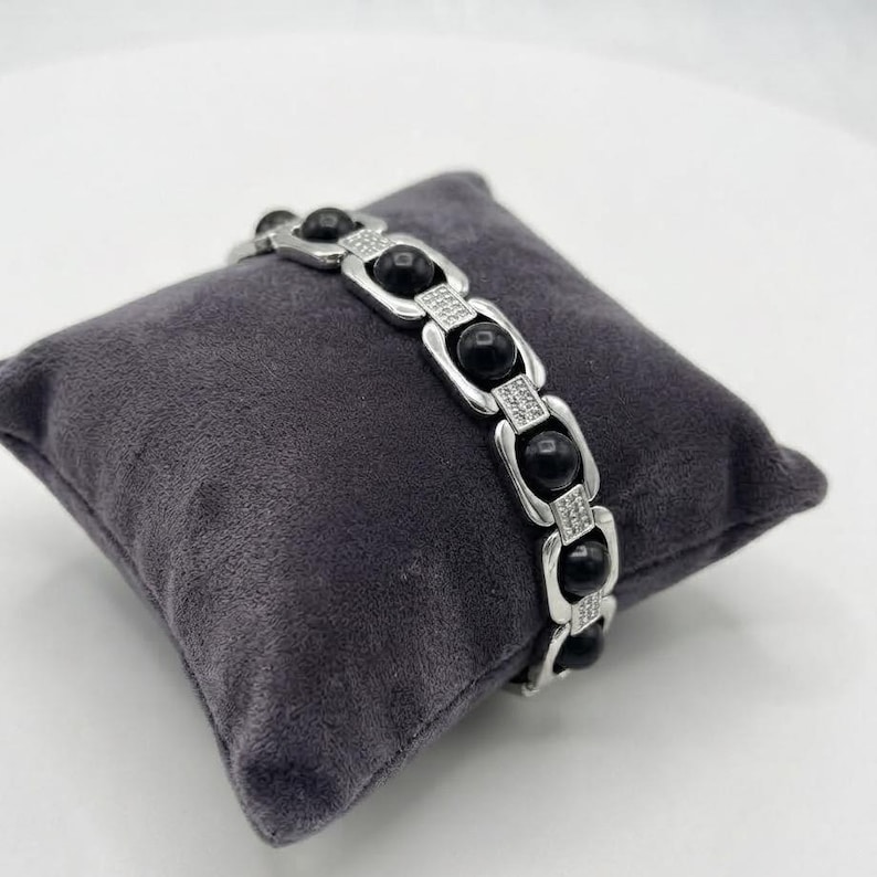 Spiritual karungali protection bracelet crafted from authentic ebony wood beads for grounding and energy balance.