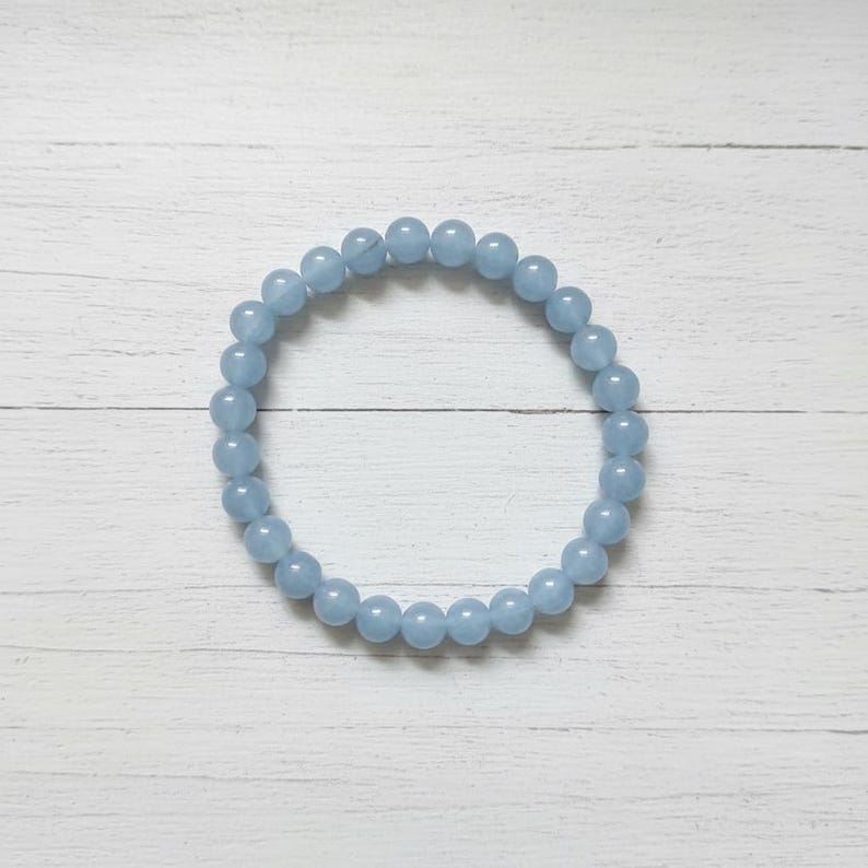Handmade light blue aquamarine beaded bracelet for healing and balance.
