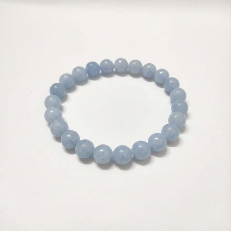 Aquamarine gemstone bracelet for calming energy and throat chakra.