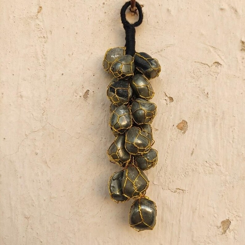 Handmade pyrite wall decor for chakra healing and abundance