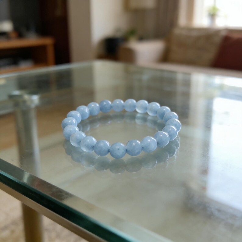 Blue aquamarine crystal bracelet designed for compassion and healing.