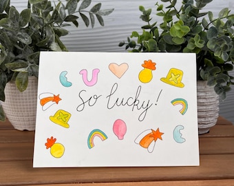 Biglietto d'auguri fatto a mano "So Lucky": portafortuna colorati