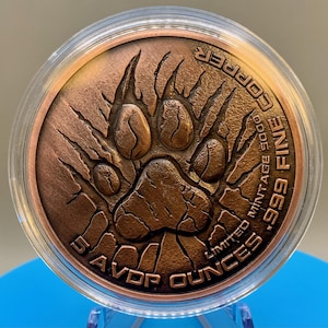 Reverse of the 5 oz copper round: antiqued lion paw print with claw marks, inscribed 5 AVDP OUNCES .999 FINE COPPER and LIMITED MINTAGE 5000