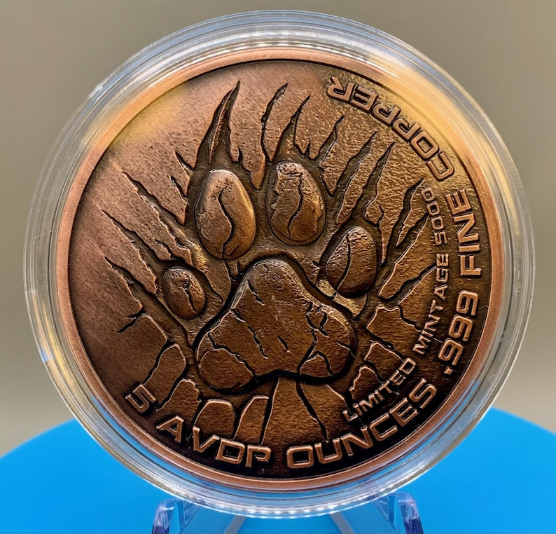 Reverse of the 5 oz copper round: antiqued lion paw print with claw marks, inscribed 5 AVDP OUNCES .999 FINE COPPER and LIMITED MINTAGE 5000
