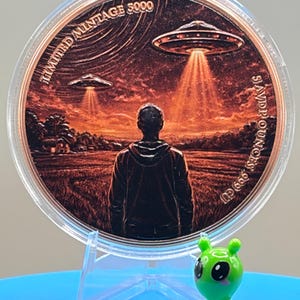 Premium 5 oz copper collectible depicting a UFO abduction scene with illuminated crop circles and vibrant sci-fi artwork.