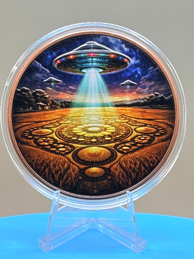 5 oz .999 fine copper round featuring a colorful UFO hovering over an intricate crop circle with glowing tractor beam artwork.