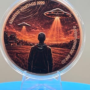Large 5-ounce colorized copper round showcasing flying saucers above a detailed crop circle under a dramatic night sky.
