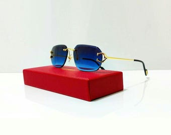 Okulary Cartier bezramkowe, złota oprawka, ciemnoniebieskie soczewki, vintage