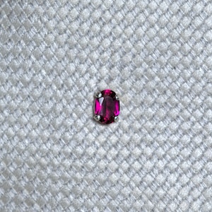 Small bright red ruby oval tie tack