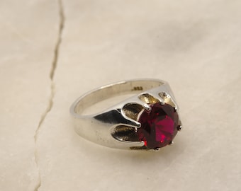 Gypsy mount ruby and sterling ring.