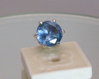 Silver and light blue spinel tie tack