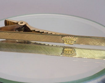 Gold filled crown tie bar.