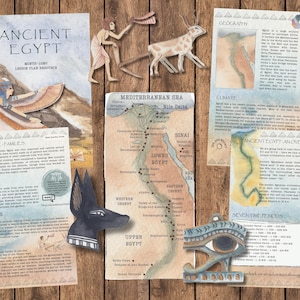 May include: Educational resources on Ancient Egypt, including a lesson plan and informational sheets. The image shows illustrations of Egyptian figures, a map of the Nile Delta, and the text "Ancient Egypt". The materials are on a wooden surface.