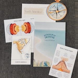 May include: A set of educational flashcards about North America and Hawaii. The cards feature illustrations of the Earth's layers, a map of North America, and a diagram of a volcano. The text on the cards includes "North America", "Hawaii", "Science & Nature", "Review of Earth's Layers", "Crust", and "Review of Volcanic Eruption".