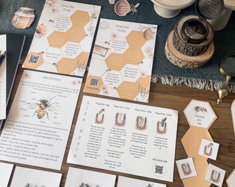 May include: A set of educational bee-themed learning materials for kids. The set includes a bee life cycle chart, a bee anatomy diagram, a bee maze game, and a bee puzzle. The materials are printed on white paper with colorful illustrations of bees and honeycombs.