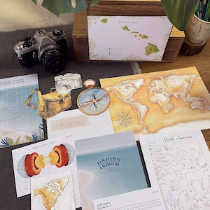 May include: A set of educational flashcards featuring illustrations of North America, Hawaii, and the Earth's layers. The cards include a world map, a map of Hawaii with its islands, and a diagram of the Earth's crust, mantle, outer core, and inner core. The cards are printed on white cardstock with colorful illustrations and text.