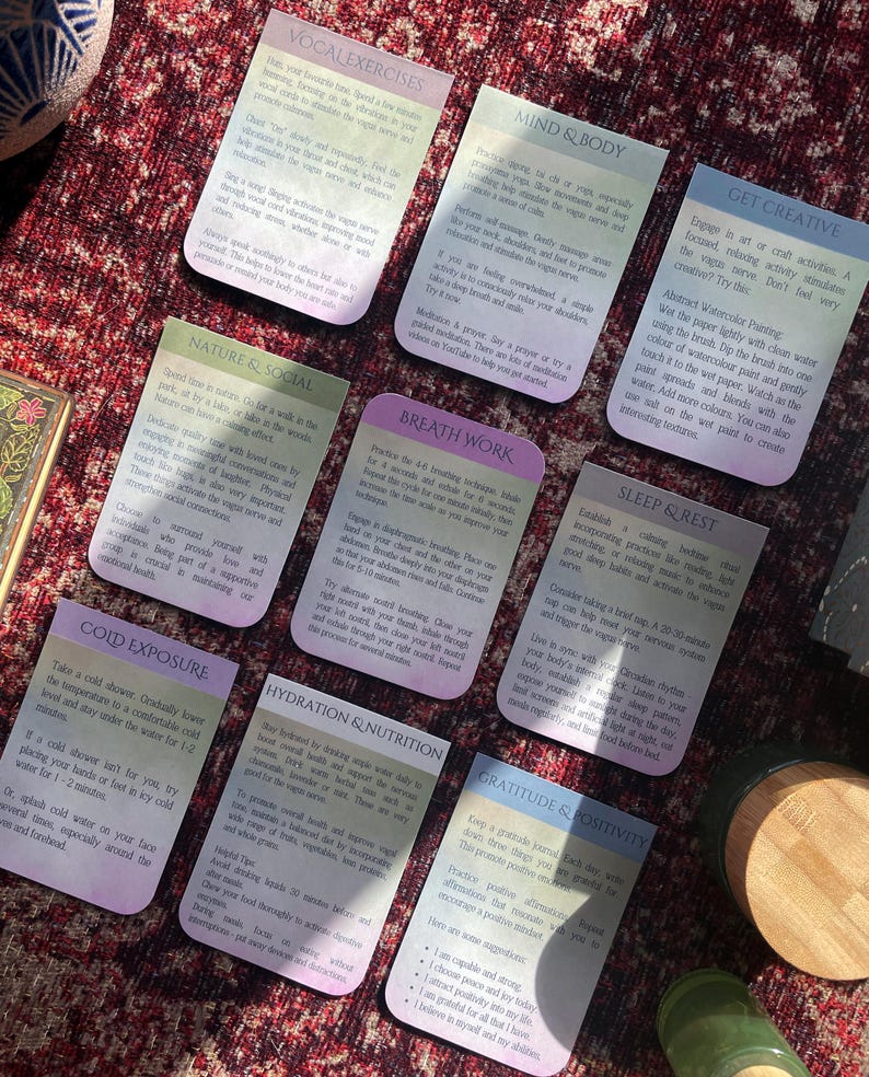 May include: A set of colorful cards with different self-care tips, such as vocal exercises, mind and body, get creative, nature and social, breath work, sleep and rest, cold exposure, hydration and nutrition, and gratitude and positivity.
