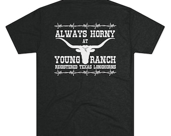 May include: Dark gray t-shirt with white text and a longhorn graphic. The text reads "ALWAYS HORNY AT YOUNG RANCH REGISTERED TEXAS LONGHORNS" with barbed wire accents. A classic tee for ranch enthusiasts.