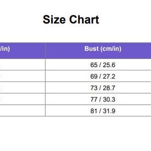 May include: A size chart with measurements in both centimeters and inches. The chart includes sizes S, M, L, XL, and 2XL, with corresponding bust, waist, and length measurements. The text "Size Chart" is at the top.