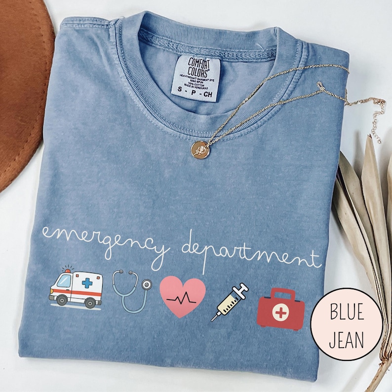 ER nurse icon tee featuring emergency room symbols and clean typography for healthcare professionals and registered nurses