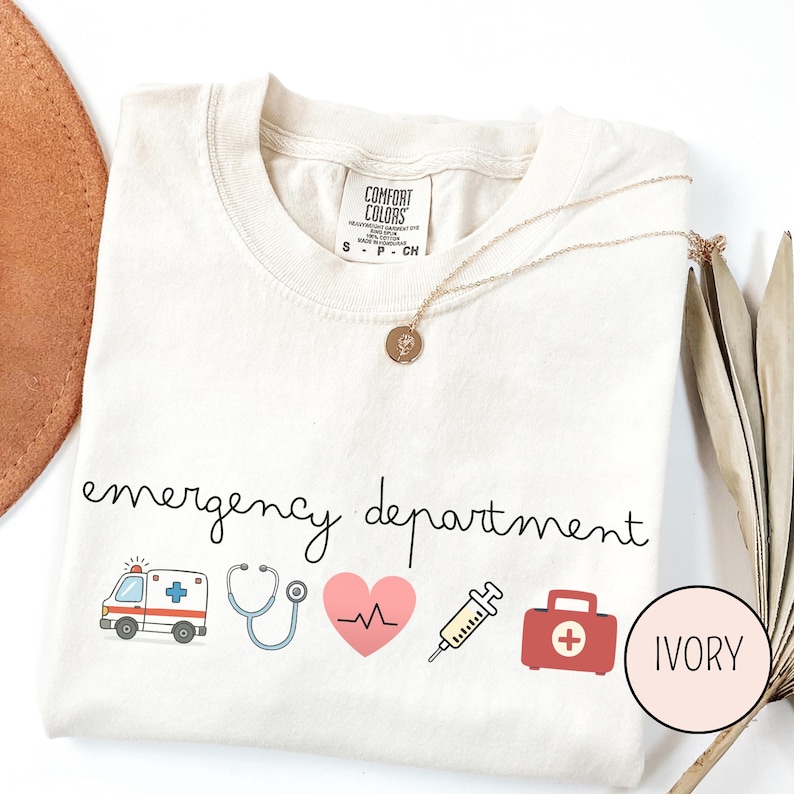 Emergency department shirt with medical icons including ambulance, stethoscope, heart and syringe in minimal style for ER nurse apparel
