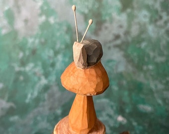 Snail on mushroom - hand carved