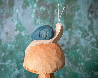 Snail on mushroom - hand carved