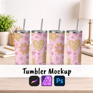 May include: Four stainless steel tumblers with pink backgrounds and a repeating pattern of gingerbread cookies, snowflakes, and candy canes. Each tumbler has a silver straw and a silver lid. The text "Tumbler Mockup" is at the bottom.