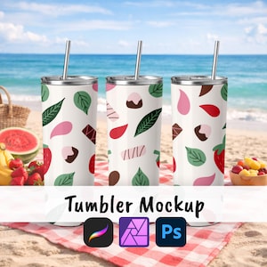 May include: Three white tumblers with silver straws, decorated with pink, red, green, and brown shapes. The tumblers are on a red and white checkered picnic blanket on a beach. The text "Tumbler Mockup" is below the tumblers.