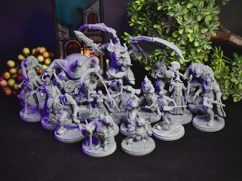 May include: A collection of gray miniature fantasy figures, including warriors, monsters, and creatures with weapons and armor. The figures are arranged on circular bases, suggesting a tabletop game or display.