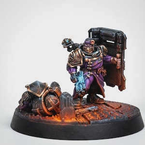 May include: Miniature figure of a warrior in purple and gold armor, holding a shield and a glowing blue weapon. Another figure lies on the ground. The base is a textured, dark brown with orange highlights, suggesting a battlefield setting.