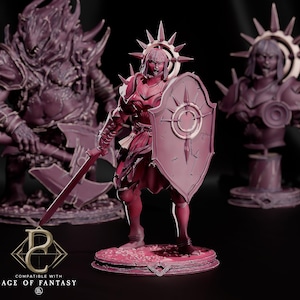 May include: A monochromatic magenta miniature figurine of a warrior in plate armor holding a sword and a large shield with a sunburst halo behind the head. The base is circular and textured. Text at the bottom reads: PC COMPATIBLE WITH AGE OF FANTASY.