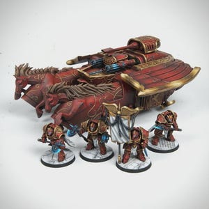 May include: A white ceramic mug with a black handle and the text "But First, Coffee" in a bold, black font. The mug is set against a blurred background, suggesting a cozy setting.