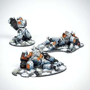 Terreno de restos de traje de combate (3u) / Miniaturas Xaiax / Tablehammer