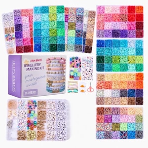 May include: A jewellery making kit with clay beads, showcasing a range of colourful beads in segmented compartments. The kit includes a box with the text "Lilly's Krafts Jewellery Making Kit" and the phrase "your masterpiece awaits!"