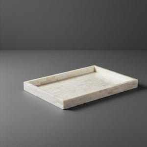 May include: Rectangular decorative tray with a light cream-colored mosaic tile pattern. The tray has a raised edge and is made of a durable material. The neutral color palette makes it suitable for various home decor styles.