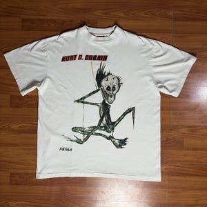 Ginseng Strip &quot;Fistula - Kurt D. Cobain&quot; Nirvana T-shirt