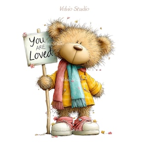 May include: A whimsical illustration of a teddy bear wearing a yellow coat, a pink and blue scarf, and white shoes. The bear holds a sign that reads "You ARE Loved". The artwork has a soft, cartoonish style with floral accents.