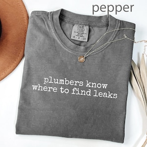 Plumbers know where to find leaks graphic tee, funny plumbing gift shirt, humorous plumber present, witty plumber t-shirt