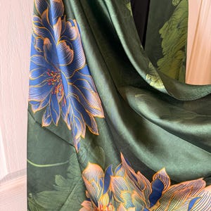 close up of blue lotus botanical art on silk fabric