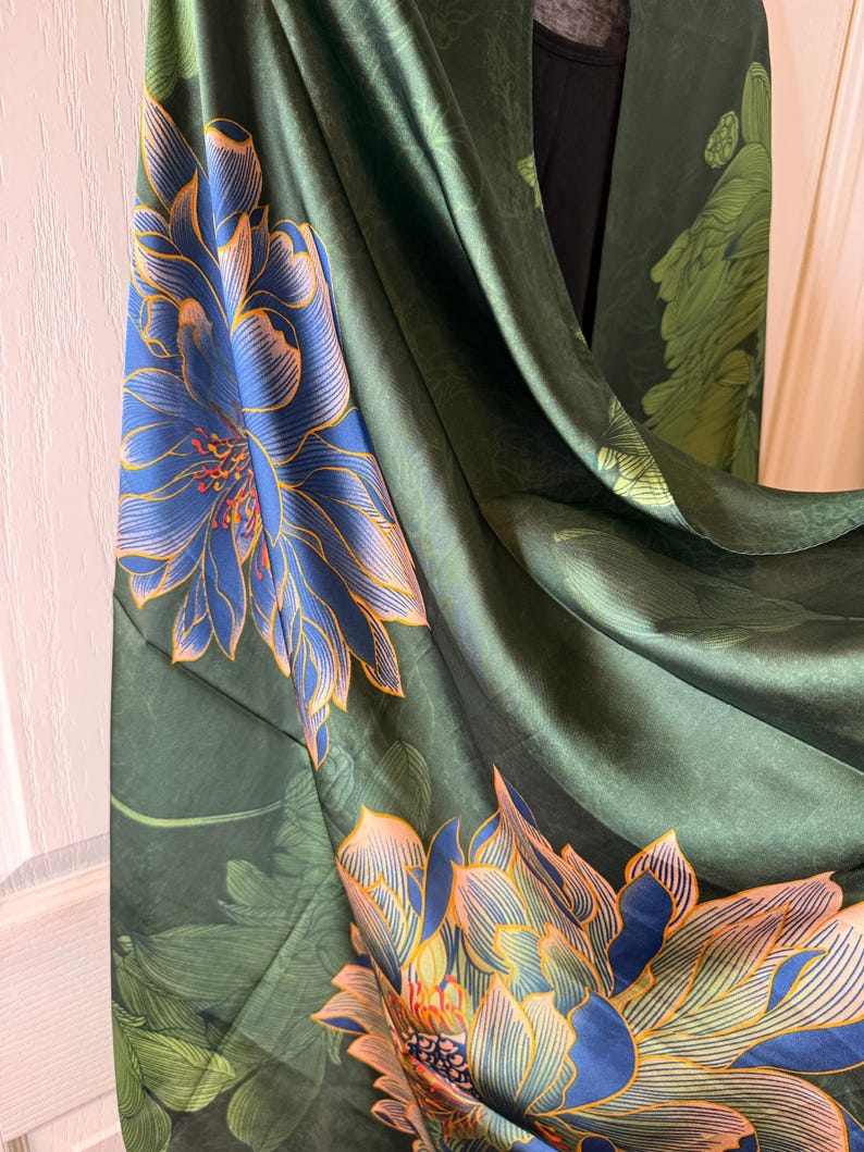 close up of blue lotus botanical art on silk fabric