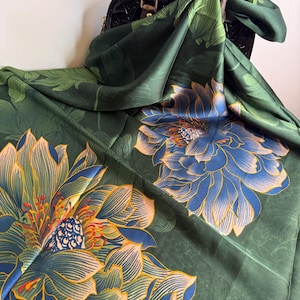 blue lotus silk scarf laid flat showing floral print