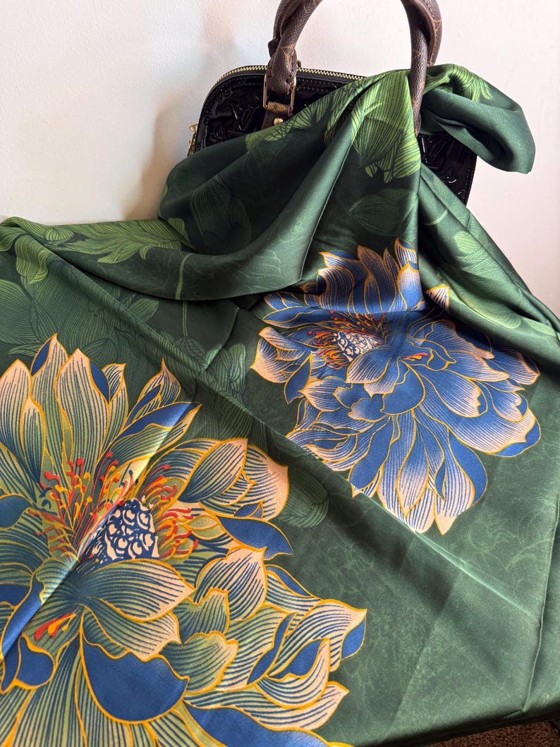 blue lotus silk scarf laid flat showing floral print